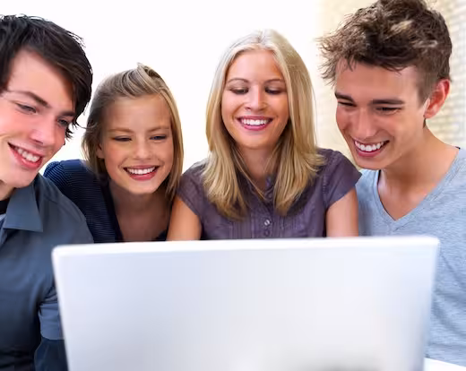 Young students working on computer