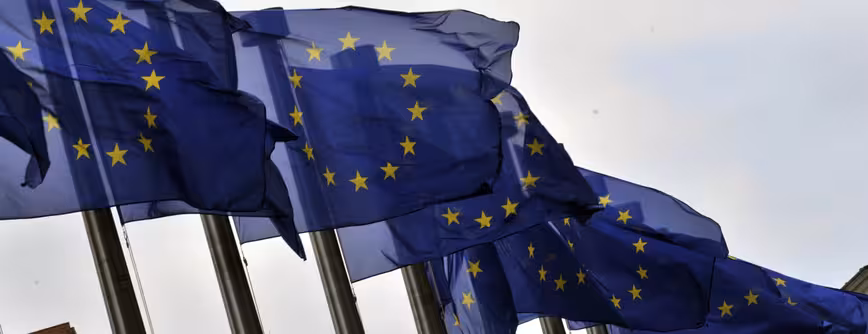European flags flutter in the wind on Ju