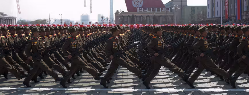 North Korean soldiers march during a mil North Korean soldiers march during a mil