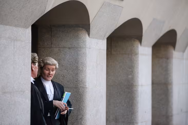 Lawyers Chat and Smoke Cigarettes Outside the Old Bailey