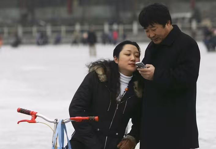 People Play On Frozen Shichahai Lake In Beijing
