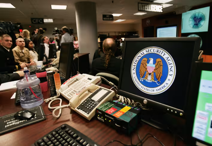 A computer workstation bears the Nationa