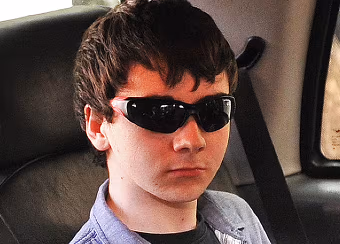 Jake Davis, 18, leaves in a taxi from We