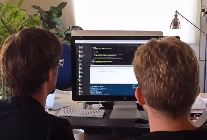 Picture of Cloud9 team members using Cloud9