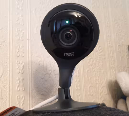 The Nest Cam, set up to observe Arashi, on top of an old bowler hat.