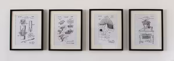 patent-prints-on-our-wall_w600