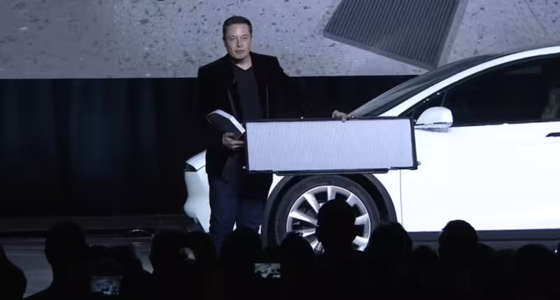Elon Musk shows off the Model X's massive HEPA filter