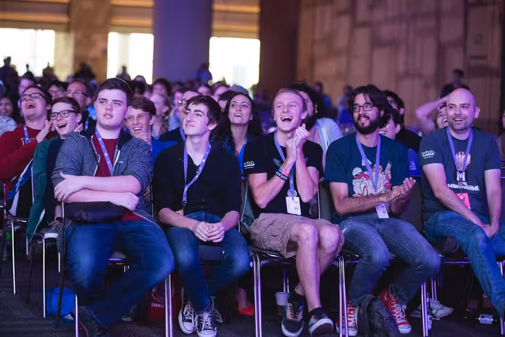 Attendees watching an event in the Kappa Theater. Photo by Robert Paul.