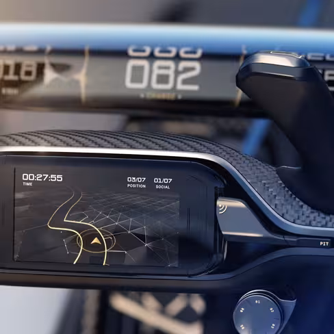A smartphone is mounted on the steering wheel for access to navigation and other functions