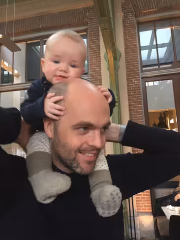 Patrick holding Bo