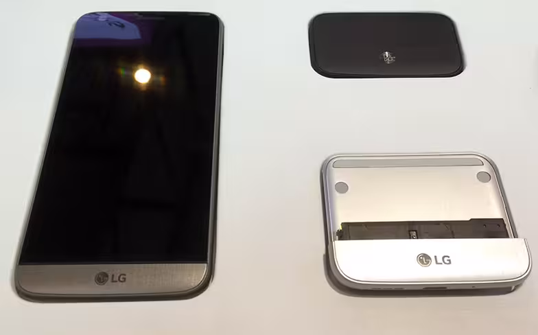 LG's G5 works with two modules, the B&O audio DAC (top right) and the Cam Plus (bottom right)