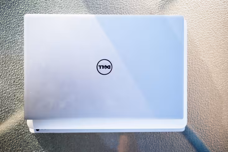 The XPS 13, above a 13-inch MacBook Pro, above a Surface Book.