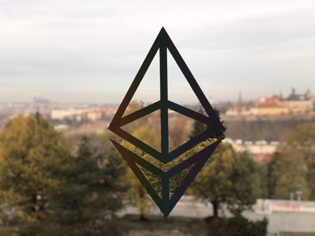 A simple example of computational photography getting depth of field wrong: everything behind the logo stuck on the window should be blurred, but the lines have confused the digital camera