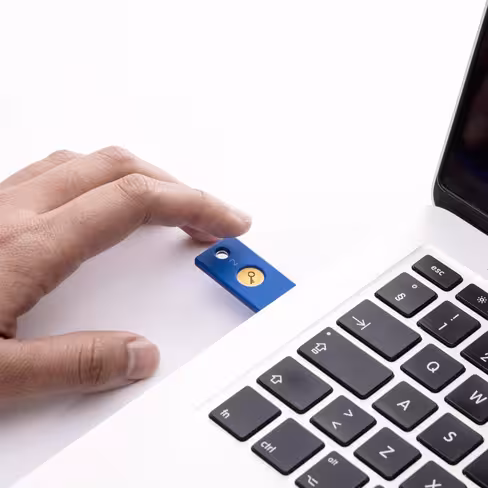 A YubiKey offers additional layers of security by authenticating you with a hardware key, as well as your fingerprint