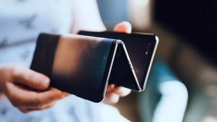 TCL's tri-fold phone has one portion of its screen fold in, and the other fold out