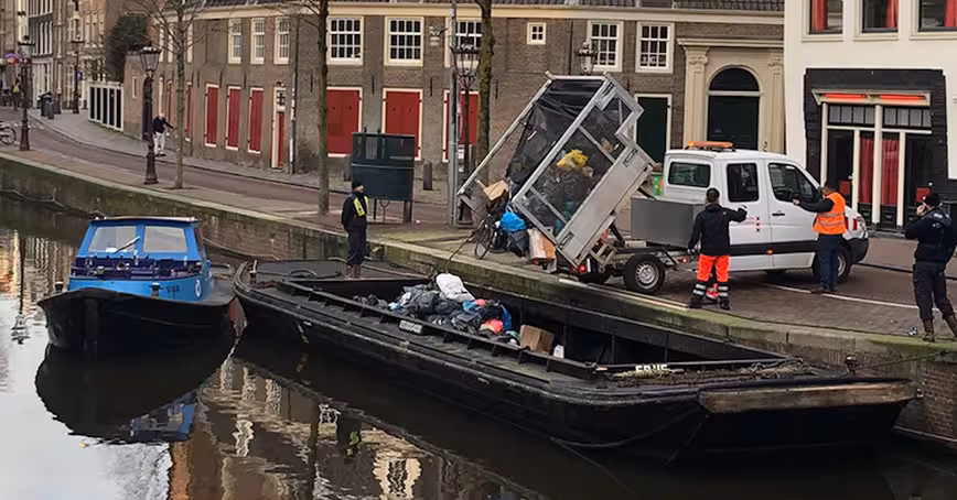 Amsterdam trials electric ‘trash boats’ to clean up its streets