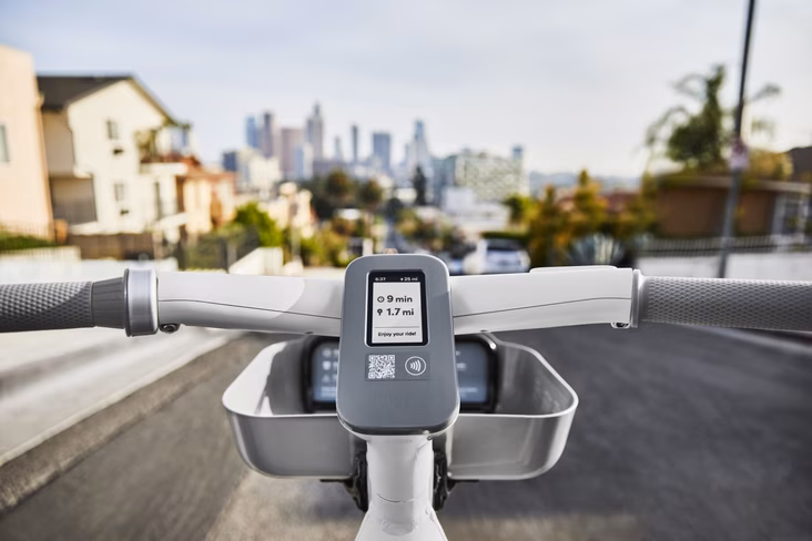 The built-in screen instructs the riders on parking, unlocking and speed limits