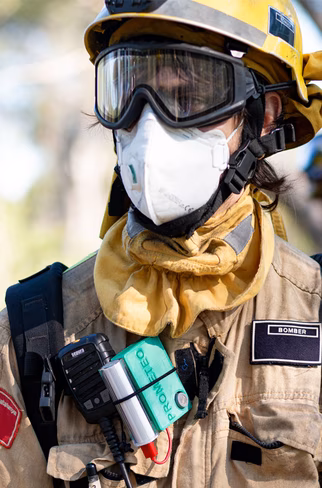 A firefighter wearing a Prometeo device