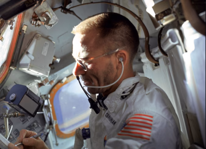 US astronaut Walter Cunningham writes with a Fisher Space Pen during the flight of Apollo 7, the first crewed Apollo flight and the Space Pen’s first trip to space. The pens have been used on every crewed NASA mission since.