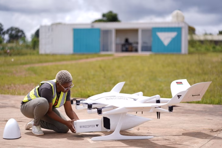 Woman servicing the Wingcopter drone