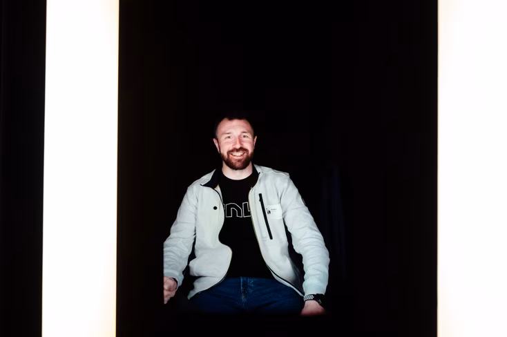 Andrii Degeler sitting inside the Framery Contact pod