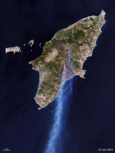 a satellite image of a wildfire burning on Rhodes island, Greece
