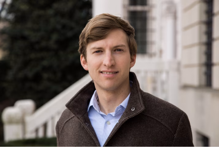 A portrait photo of Chris Miller, the author of Chip War