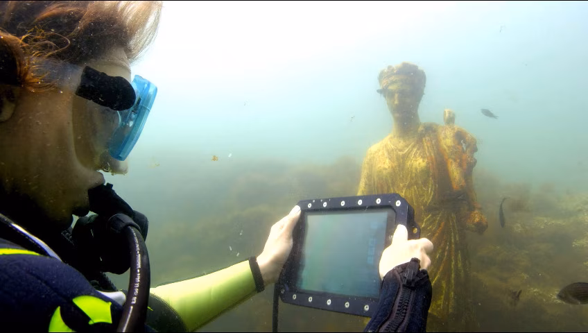 diver at the underwater city of Baia