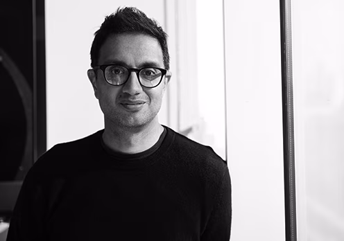 Black and white photo of Hussein Kanji 