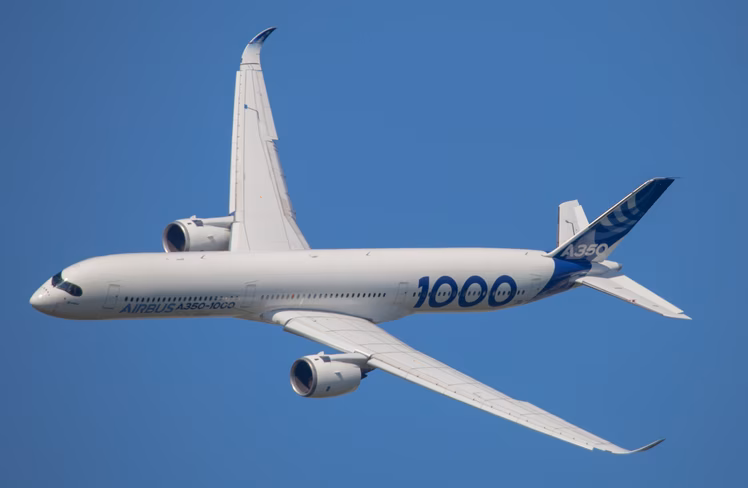 An Airbus A350-100 flying through the sky. The plane could be equipped with new automation features.