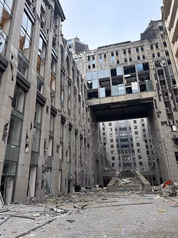 The damaged exterior of the MacPaw building after the Russian missile strike