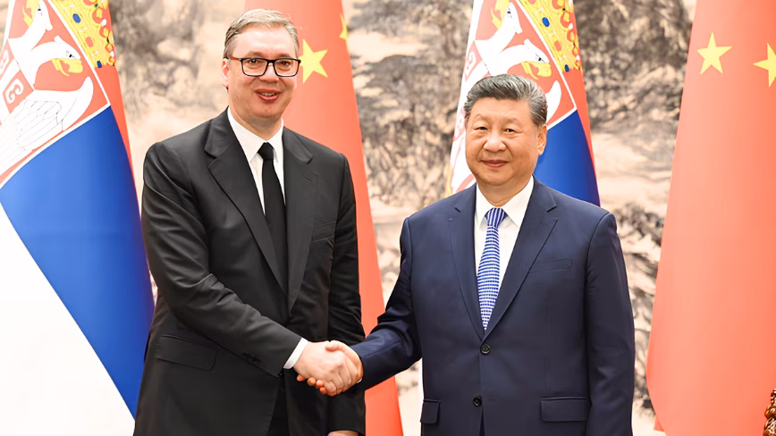 Vučić flew to Beijing for a $1.1bn Chinese investment, while Belgrade burned