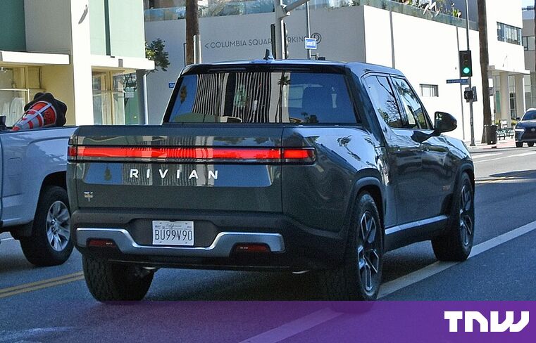 https://media.thenextweb.com/2026/06/rivian-layoffs-hundreds-r2-profitability-ev-market.jpg