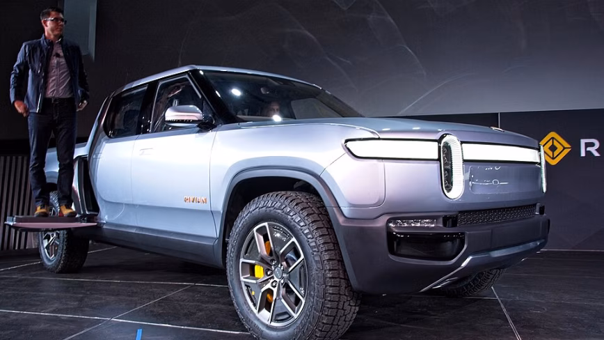 Rivian CEO says supervised point-to-point self-driving will arrive this year, and he’s comparing it directly to Tesla’s FSD