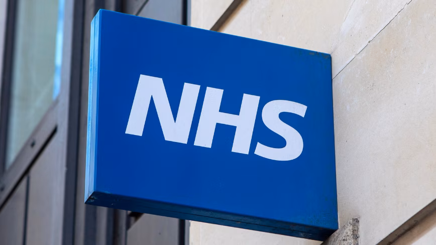 Close-up of an NHS - National Health Service - sign in London, UK.