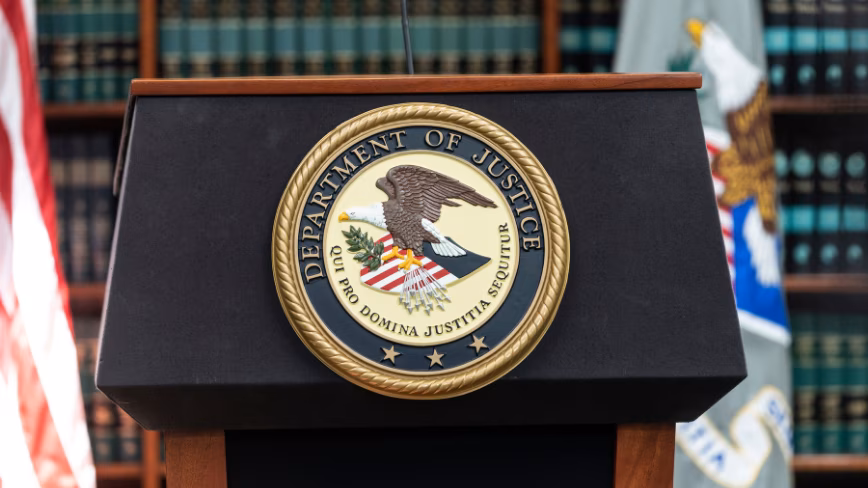 The Justice Department rewrote its own hacking announcement two days later