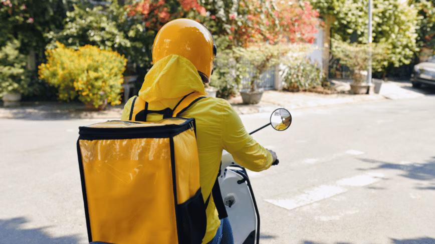 China’s delivery giants spent a year fighting on price. Now they’re fighting on their riders’ heads.
