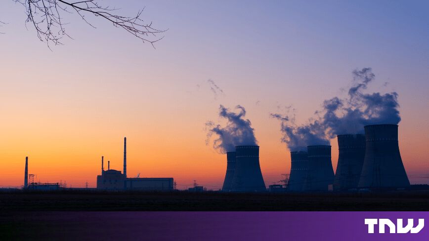 https://media.thenextweb.com/2026/08/nuclear-plant-sunset.jpg