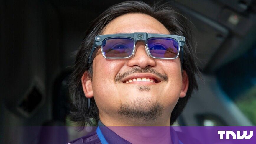https://media.thenextweb.com/2026/09/amazon-delivery-driver-smart-glasses-cameras-smiling.jpg