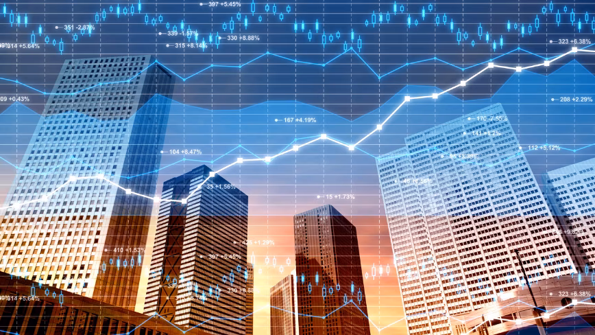 Business district: stock market and finance data on city background