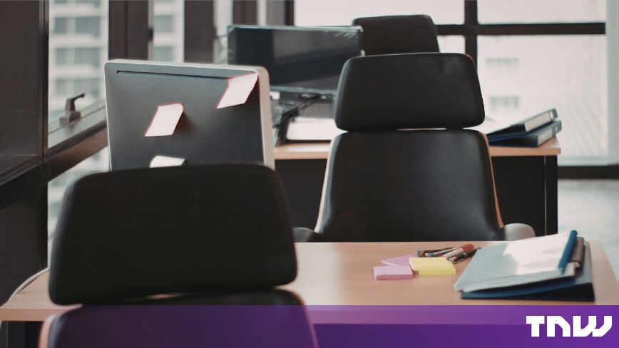 https://media.thenextweb.com/2026/09/empty-office-desks-chairs-sticky-notes.jpg