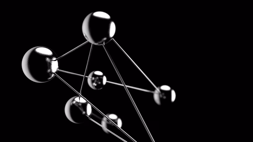 3D render of chrome spheres linked by thin metal rods, forming a connected network against a black background.
