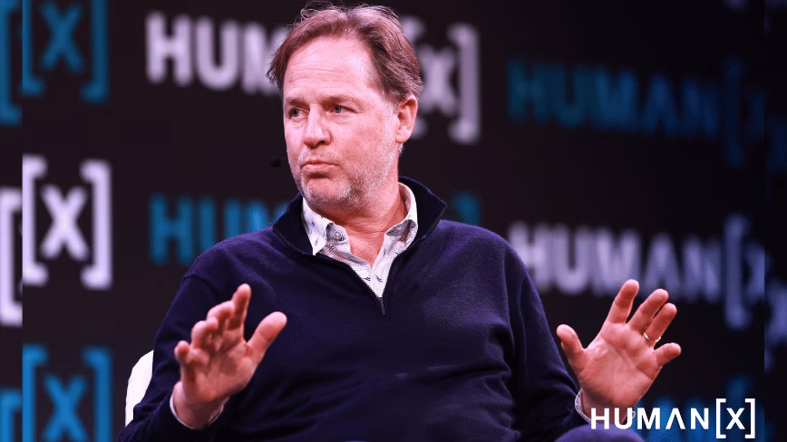 Nick Clegg, general partner at Hiro Capital, gestures with both hands as he speaks on stage at HumanX in Amsterdam