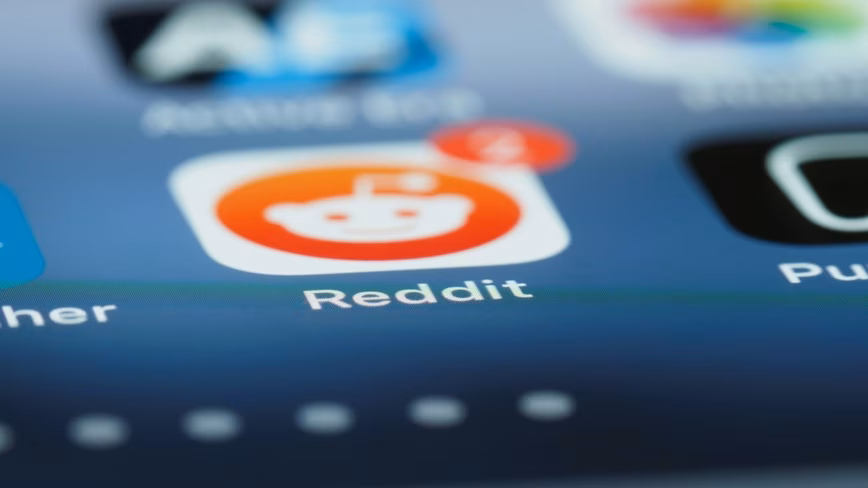 Reddit app icon on a smartphone