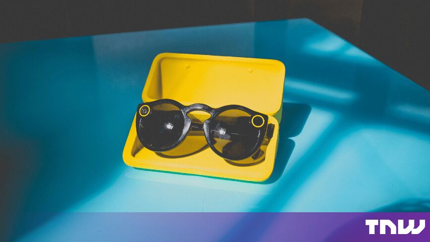 https://media.thenextweb.com/2026/09/snap-spectacles-camera-sunglasses-yellow-case.jpg