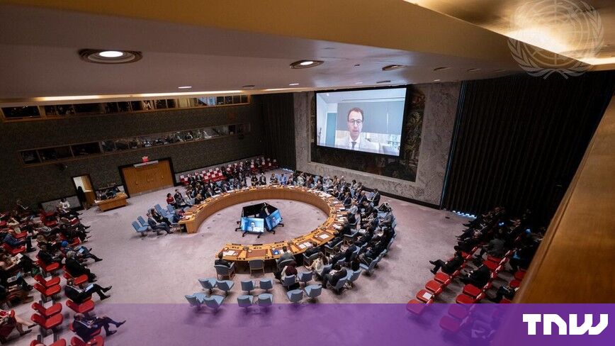 https://media.thenextweb.com/2026/09/un-security-council-chamber-video-screen.jpg