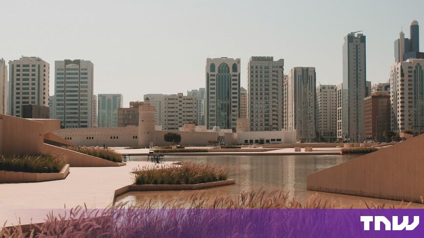 https://media.thenextweb.com/2026/10/abu-dhabi-skyline-qasr-al-hosn-fort-reflecting-pool.jpg