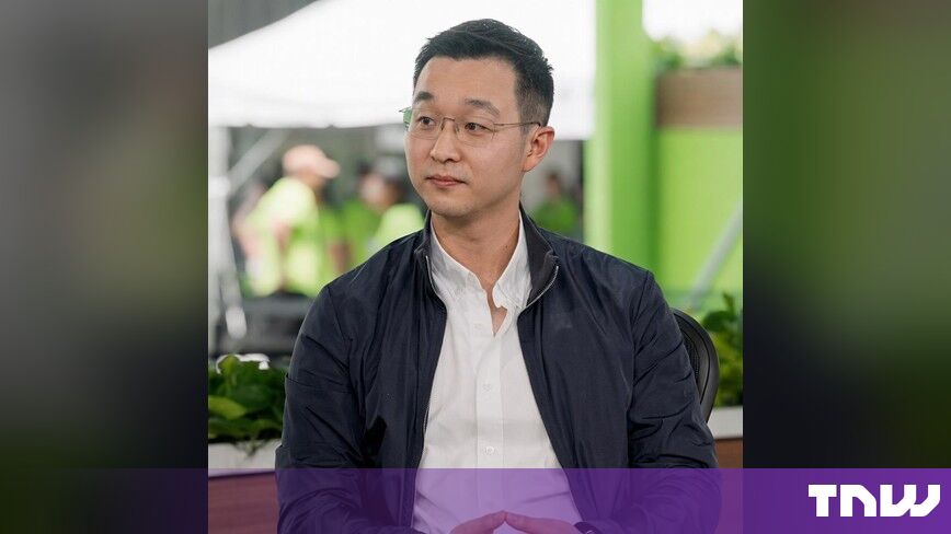 https://media.thenextweb.com/2026/10/alex-yeh-gmi-cloud-ceo-navy-jacket-interview.jpg