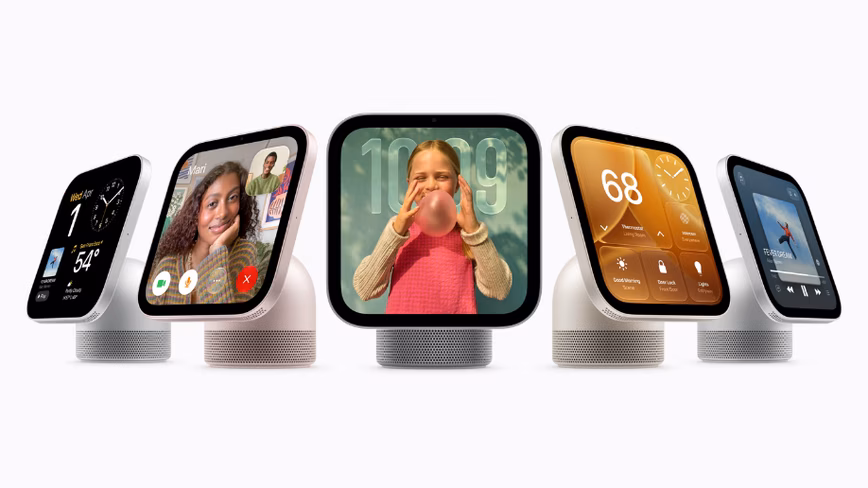 Five Apple HomeView smart displays in a row on domed speaker bases, each screen showing a different interface.
