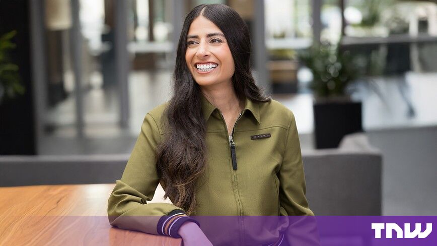 https://media.thenextweb.com/2026/10/asha-sharma-xbox-ceo-olive-jacket-smiling-office.jpg